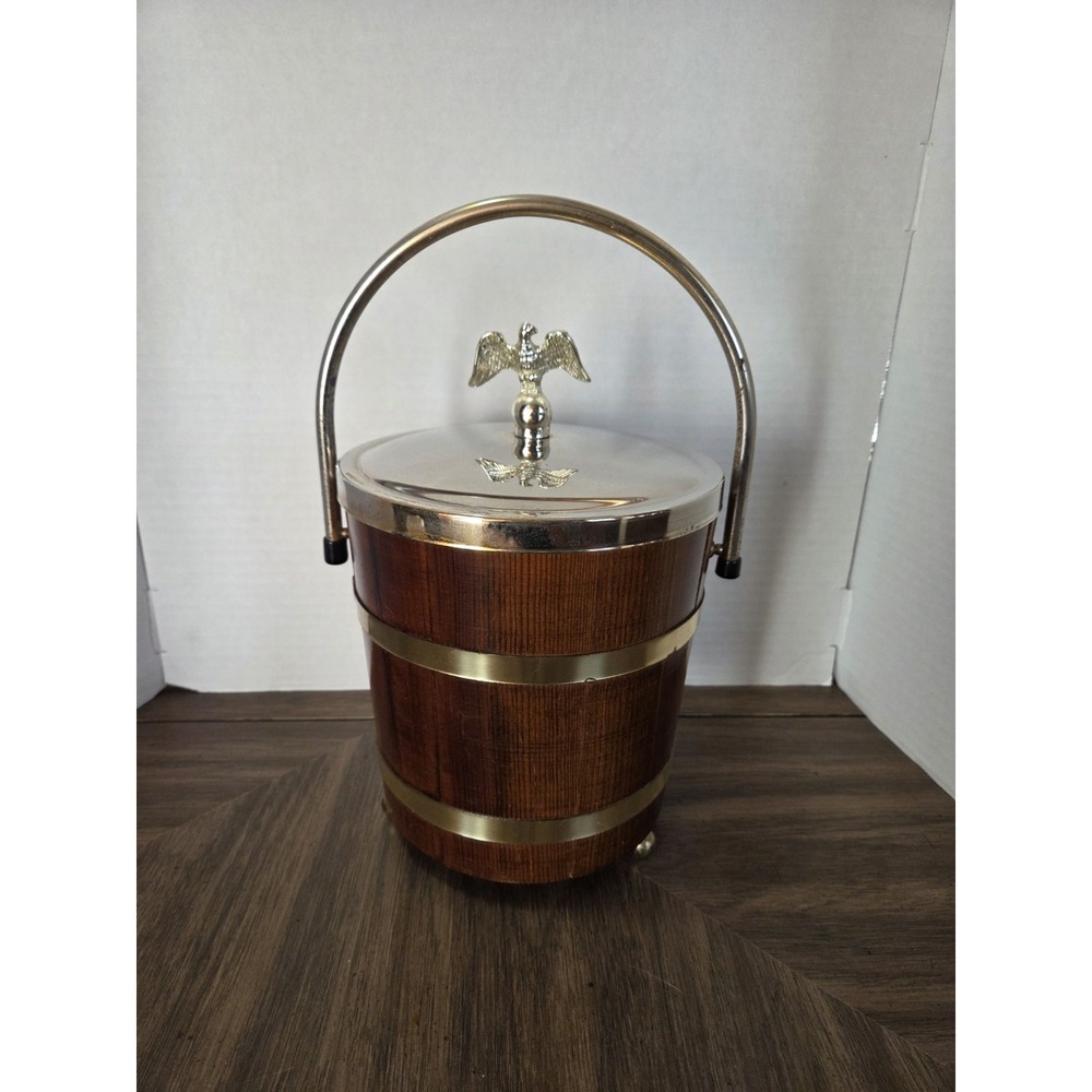 vintage Jerywil wood and brass-accented footed ice bucket from the 1970s